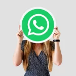woman showing whatsapp messenger icon 53876 41312